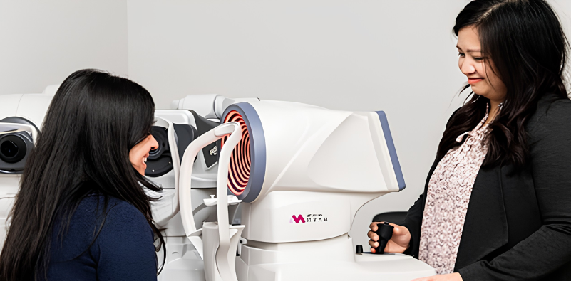 Patient undergoing a dry eye assessment using MYAH technology with an eye care professional.